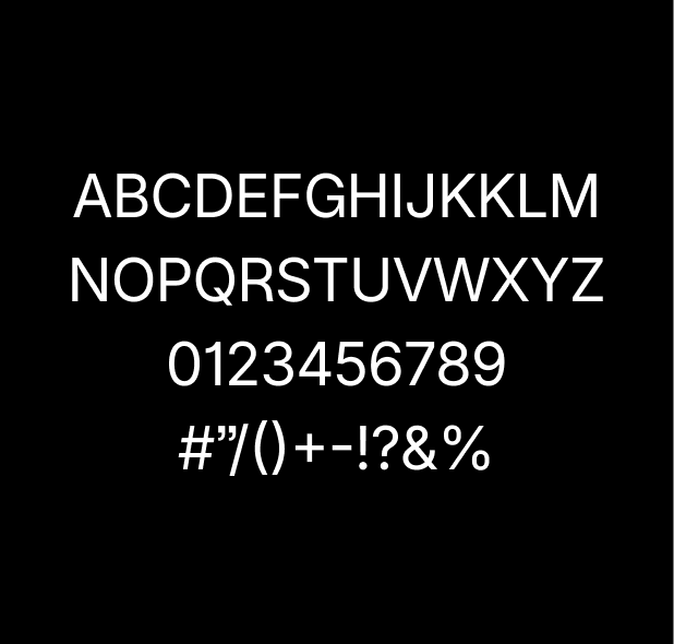 Graphic of a typography specimen showing the alphabet and numerals on top of a dark gray background.